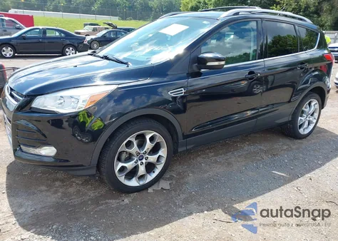 2016 Ford Escape Titanium z USA, uszkodzony, nr VIN 1FMCU0JX8GUB03579